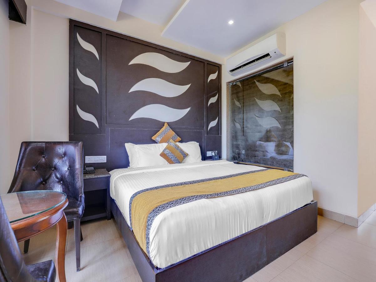 กร็องเดอ เดอ สันจี Hotel กาลังกูติ ห้อง รูปภาพ